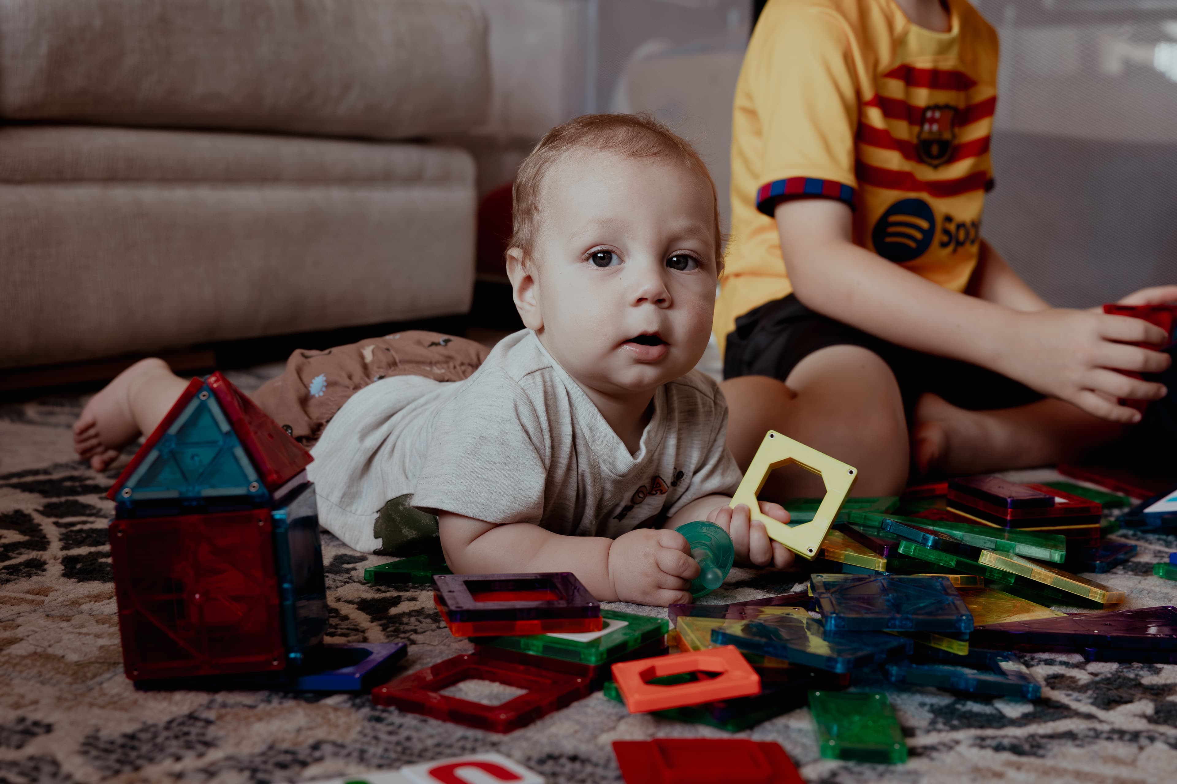 Child playing indoors - candid childhood moment
