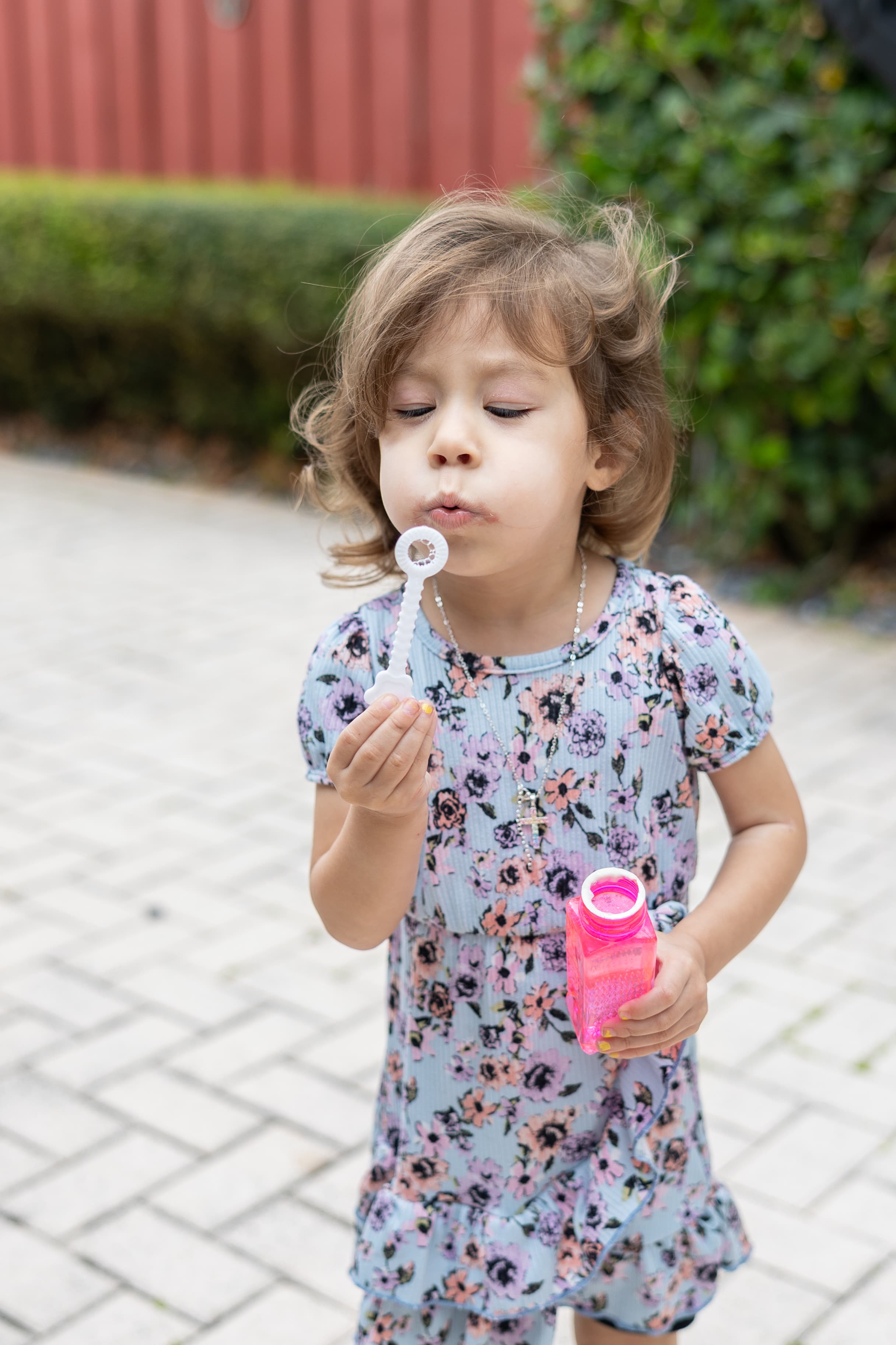 Child blowing bubbles