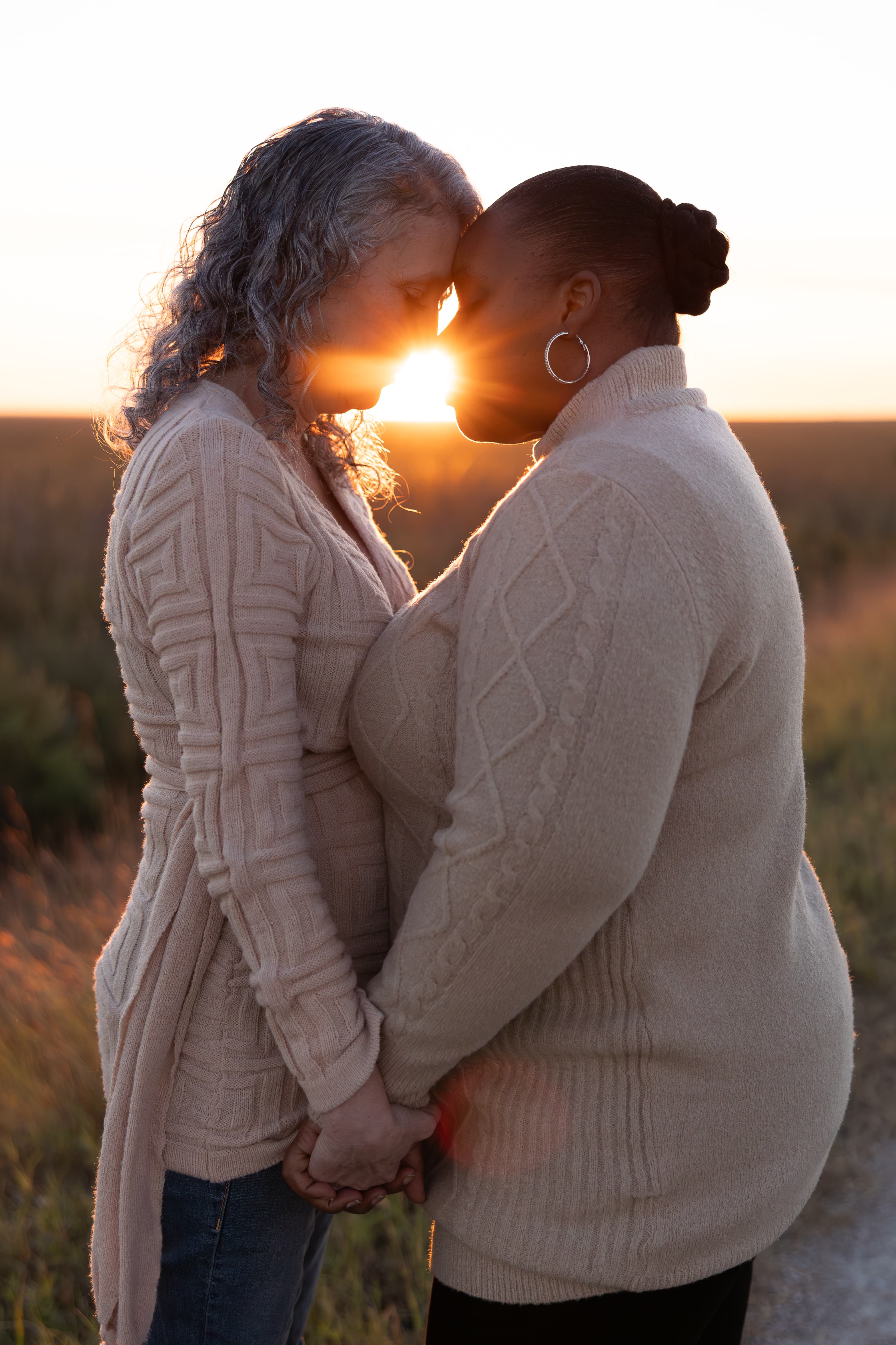 Couple at golden hour embracing