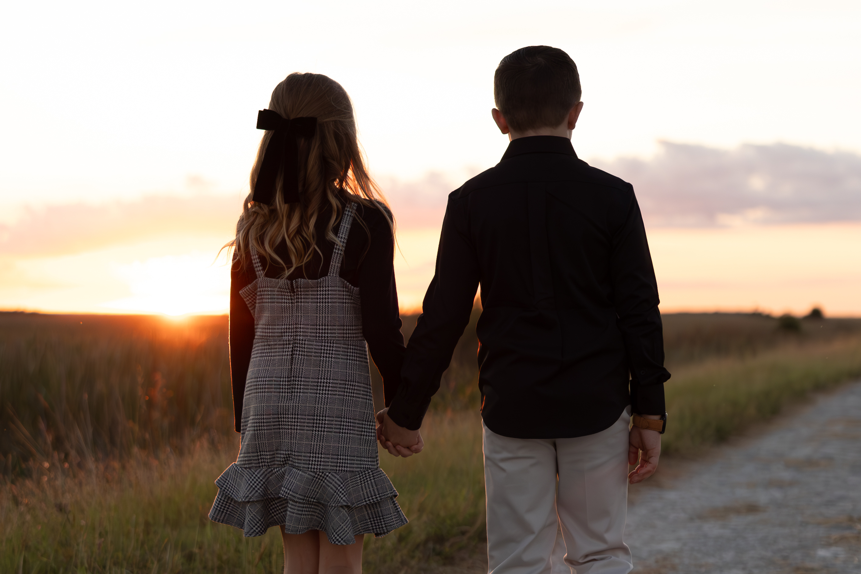 Siblings Holding Hands